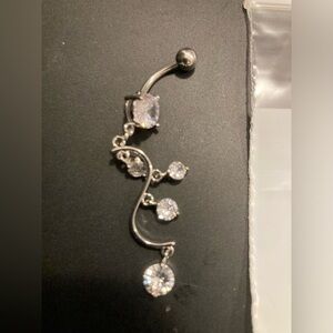 Belly button ring. Dangle style. Brand new in bag. See pictures for All details